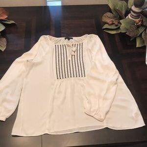 White shirt with black details